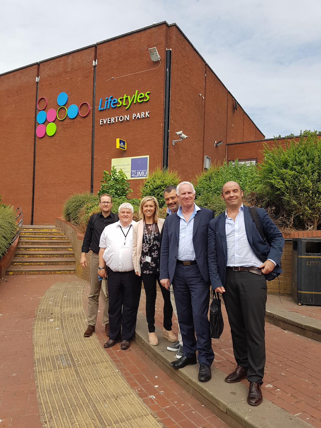 The delegation standing on the steps of Lifestyles Everton Park